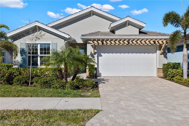 view of front of property featuring a garage