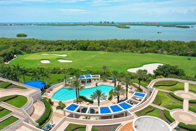 4951 Bonita Bay Blvd Unit 604, Bonita Springs, FL 34134 - aerial view of a large body of water, a pool, and a local golf course