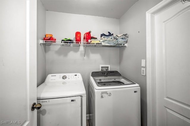 laundry area with washer and dryer