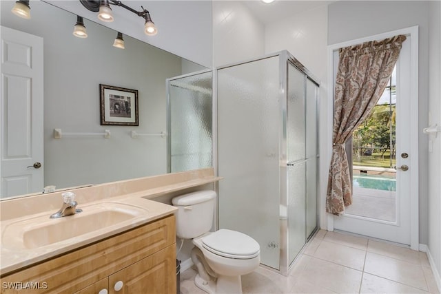 bathroom featuring tile patterned floors, plenty of natural light, and a shower with shower door