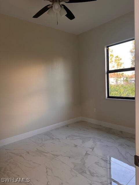 spare room featuring ceiling fan