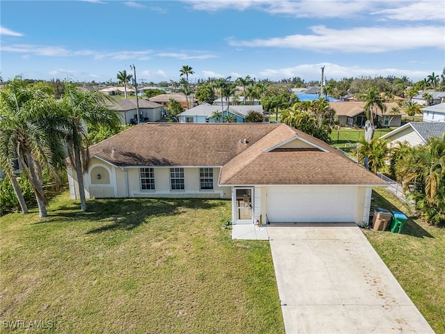 single story home featuring a front yard and a garage