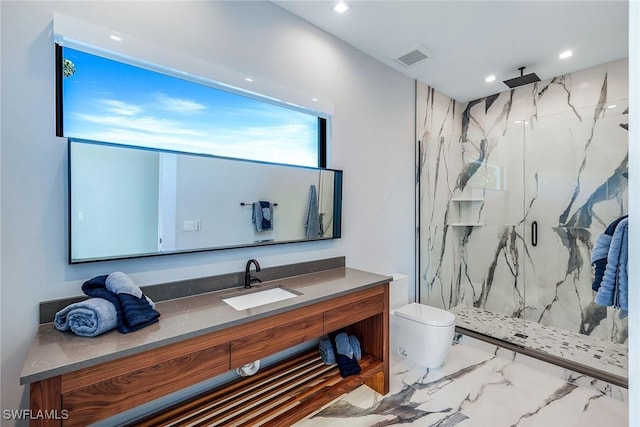 bathroom featuring vanity, toilet, and an enclosed shower