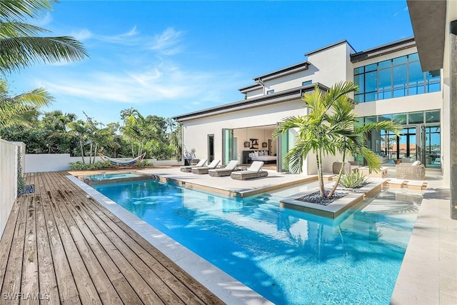 view of pool with a deck