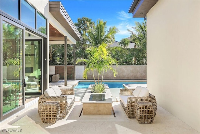 view of swimming pool with a patio