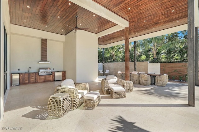 view of patio / terrace featuring area for grilling, ceiling fan, and sink