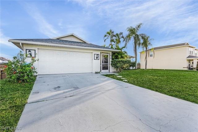 single story home featuring a front lawn and a garage