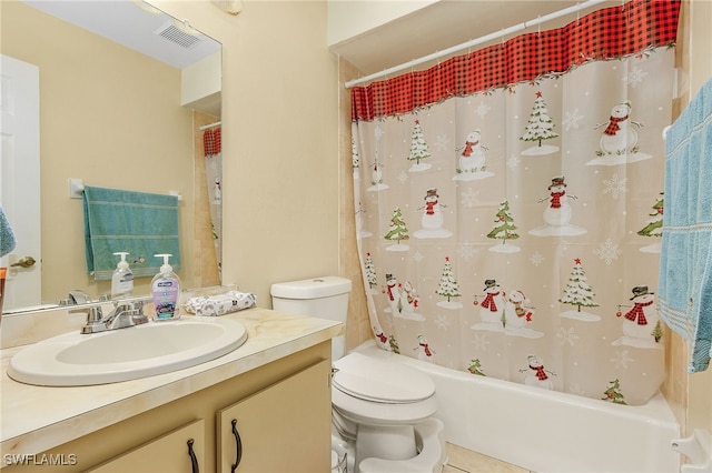 full bathroom with tile patterned floors, vanity, toilet, and shower / bath combo with shower curtain