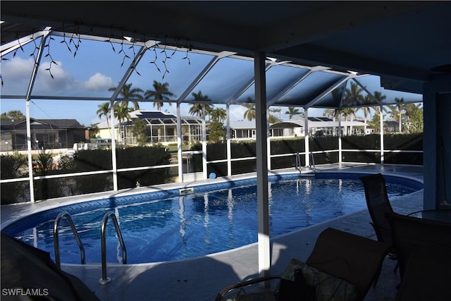 view of pool featuring a patio