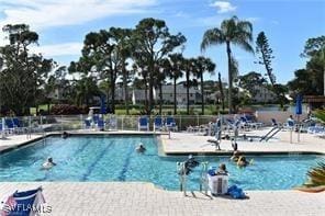 view of swimming pool featuring a patio