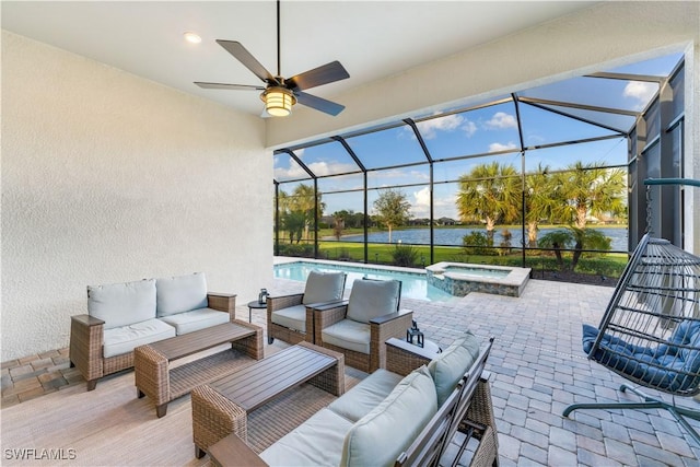 view of patio with a lanai, a pool with hot tub, a water view, and an outdoor hangout area