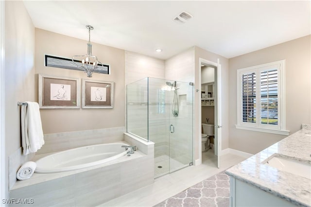 full bathroom with plus walk in shower, tile patterned flooring, a chandelier, toilet, and vanity