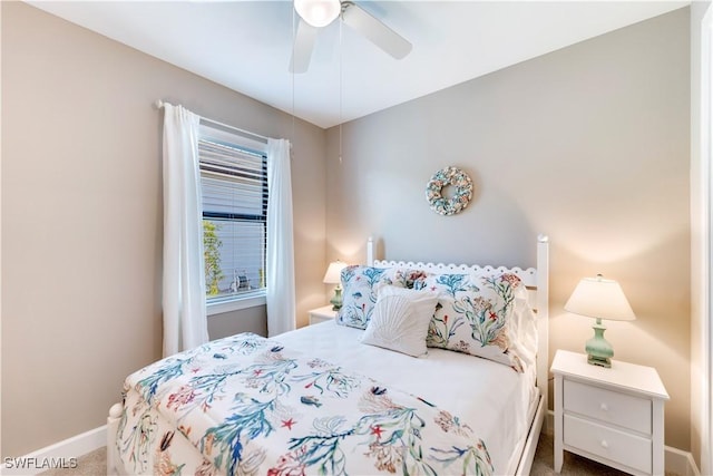 bedroom with ceiling fan and carpet