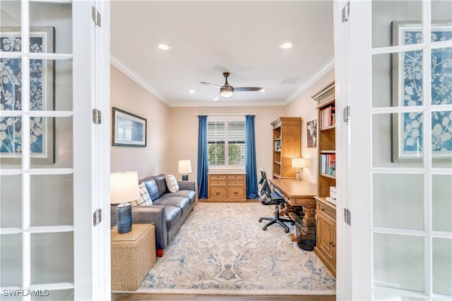 office space with hardwood / wood-style floors, ceiling fan, and ornamental molding