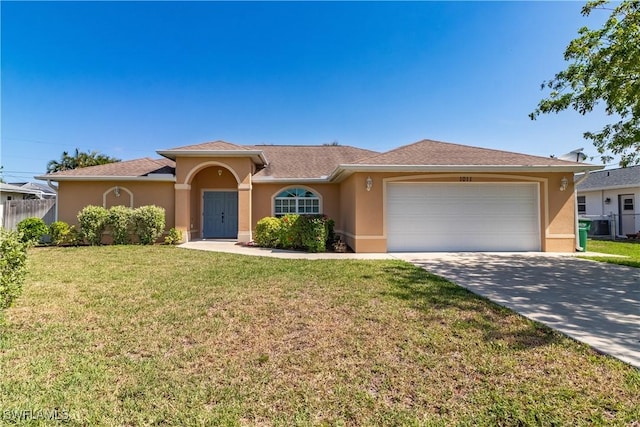 view of front facade featuring a front lawn and a garage