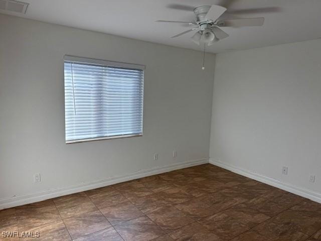 empty room with ceiling fan