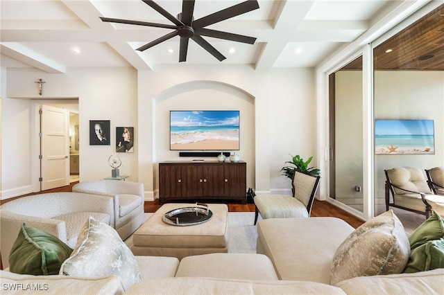 living room with beam ceiling, hardwood / wood-style flooring, ceiling fan, and coffered ceiling