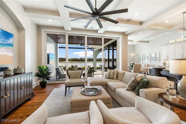 living room with beam ceiling, dark hardwood / wood-style flooring, ceiling fan, and coffered ceiling