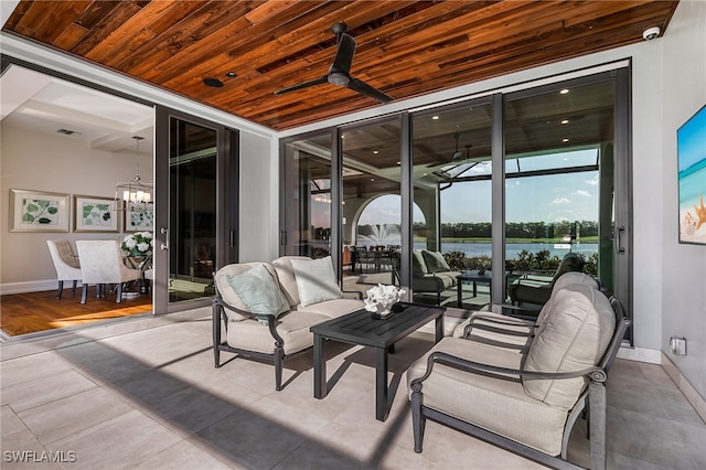 view of patio / terrace with ceiling fan and an outdoor hangout area