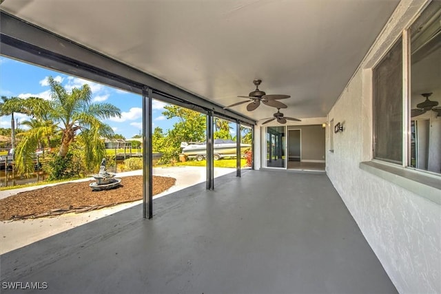 view of patio with ceiling fan