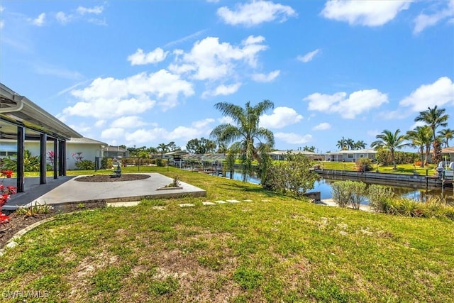 view of yard with a water view