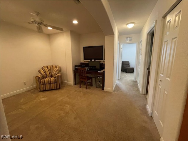 corridor with light colored carpet