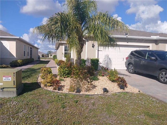 view of property exterior featuring a garage and a lawn