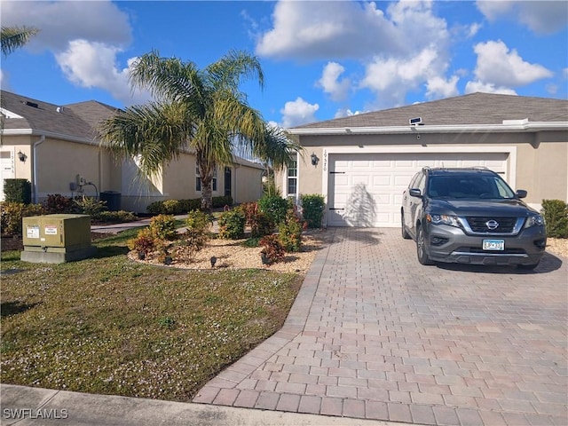 view of front of home with a garage