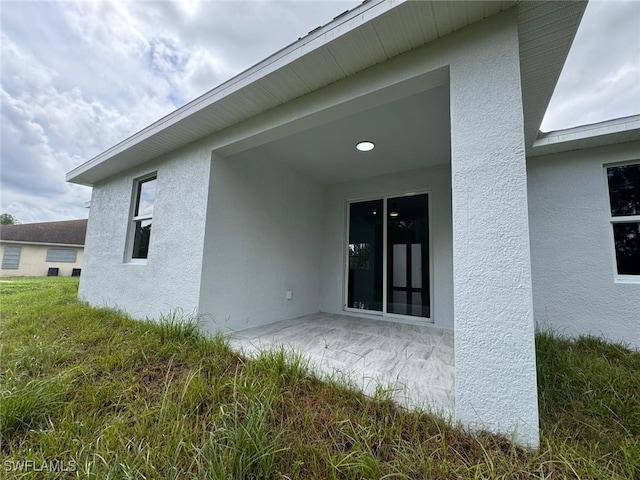 back of house featuring a patio area