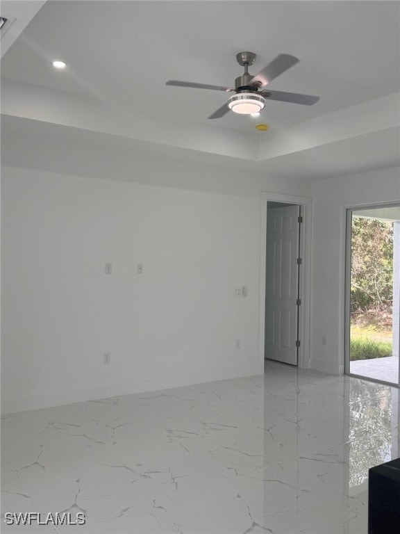 spare room featuring ceiling fan