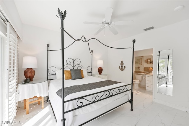 bedroom featuring connected bathroom and ceiling fan