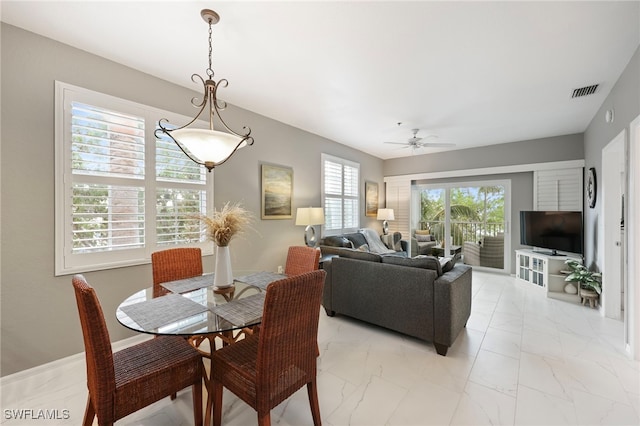 dining room with ceiling fan