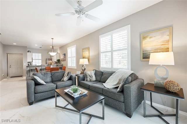 living room featuring ceiling fan