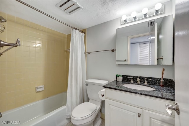 full bathroom with vanity, shower / tub combo with curtain, a textured ceiling, and toilet