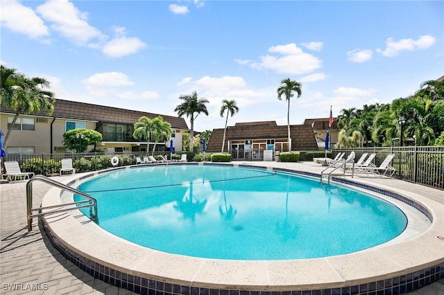 view of swimming pool with a patio area