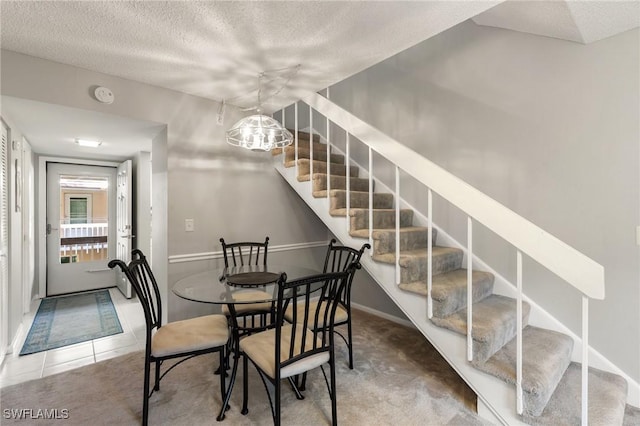 dining room featuring carpet