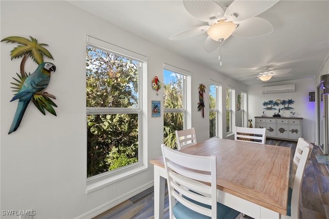 dining room featuring ceiling fan, a wealth of natural light, an AC wall unit, and wood-type flooring