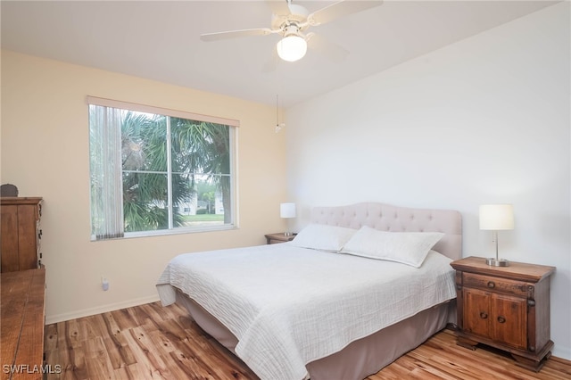 bedroom featuring ceiling fan and light wood-type flooring