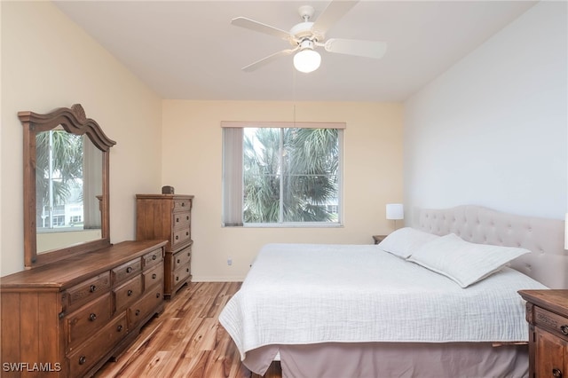 bedroom featuring ceiling fan and light hardwood / wood-style flooring