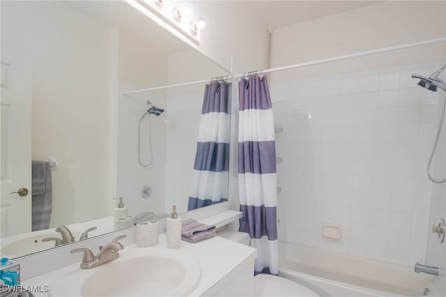 full bathroom with vanity, toilet, and shower / tub combo