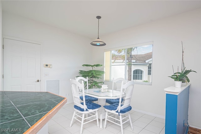 view of tiled dining area