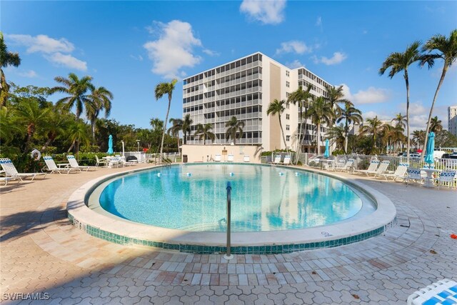 view of swimming pool with a patio area