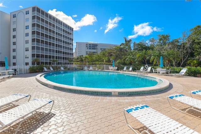 view of pool featuring a patio