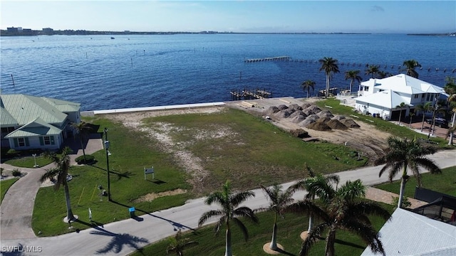 drone / aerial view with a water view