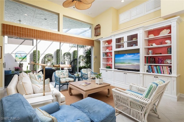 sunroom / solarium with ceiling fan