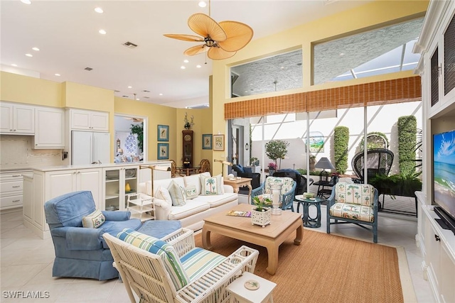 living room featuring recessed lighting, visible vents, ceiling fan, and light tile patterned floors