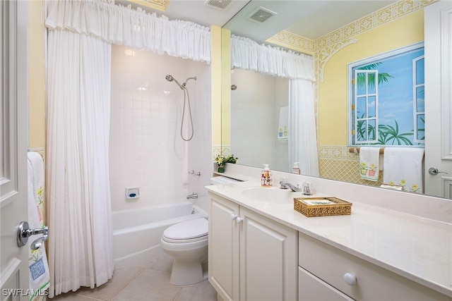 full bathroom featuring tile patterned floors, vanity, toilet, and shower / bath combo with shower curtain