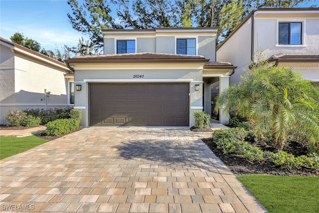 front of property featuring a garage