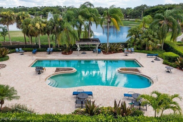 community pool featuring a patio area