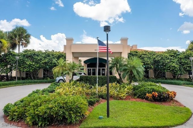 view of property with driveway